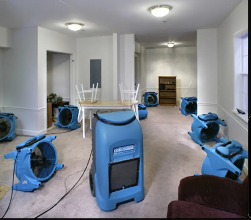 Air movers and dehumidifier setup for Water Damage Restoration in West Lealman
